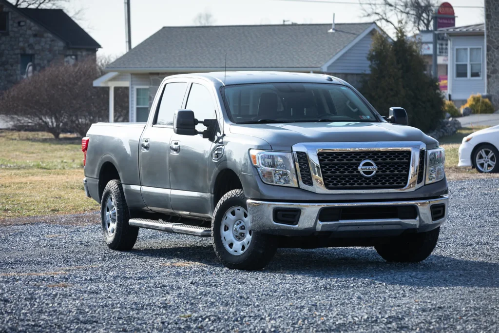 A photo of a gray truck from the front