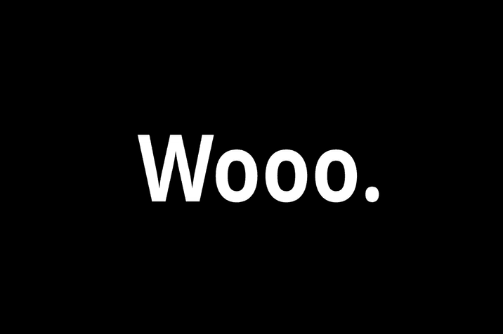 A still image of a black background and white text that says "Wooo."